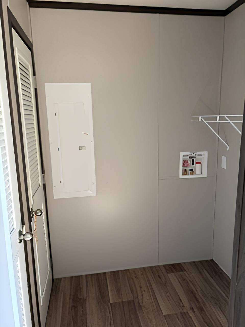 Laundry room with washer hookups in The Blitz 24x66