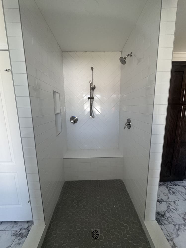 Large tiled walk-in shower in The Shoreline by Franklin Homes