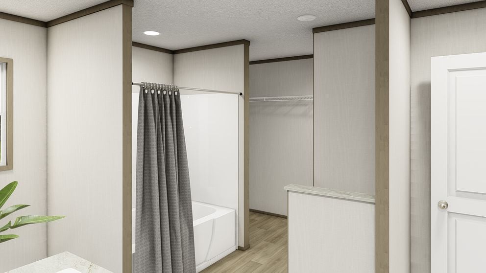 Modern vanity and bathroom layout in the Clayton Epic Snowcap