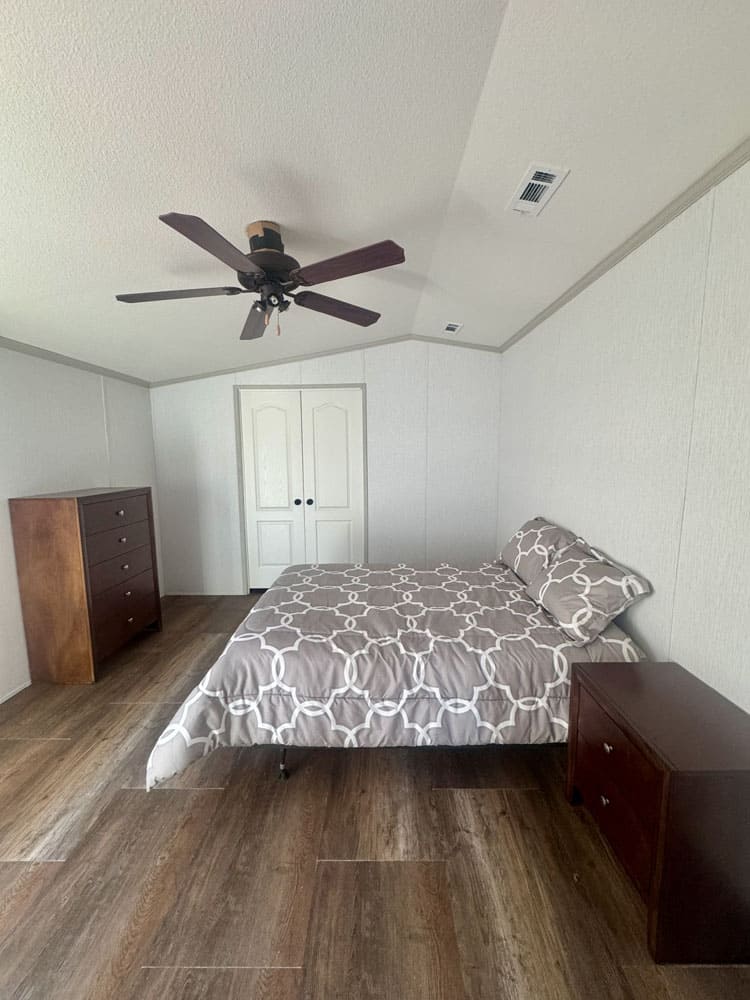 Spacious bedroom in the 3 bedroom H-1880-32E home for sale in Conroe, Texas
