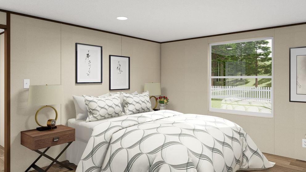 Primary bedroom in The Glory by TRU Homes