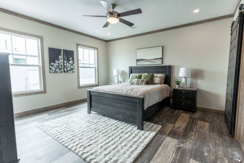 Spacious primary bedroom in The Shoal Creek modular doublewide
