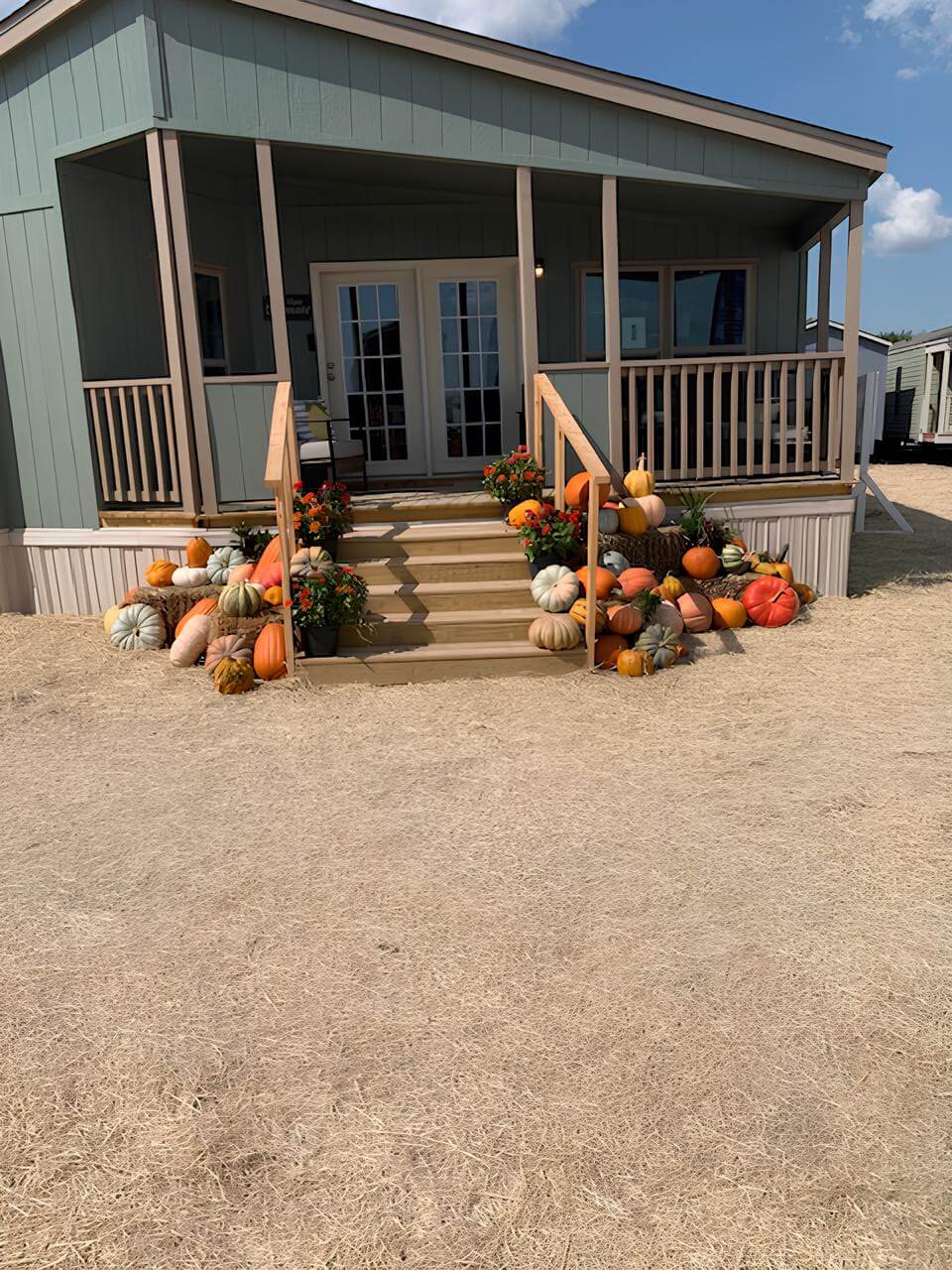 Front porch exterior of The Lakehouse manufactured home at New Start Homes in Bonham, TX