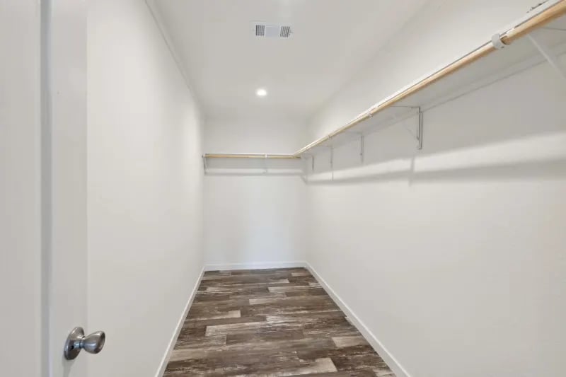 Primary closet in the Winter Series 3276H by Champion Homes at Factory Mobile Homes Colorado