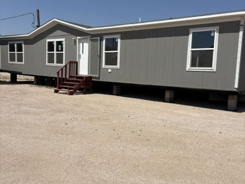 Exterior of used 32x76 doublewide home for sale in Midland TX