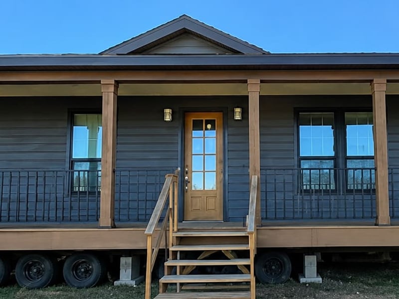 Covered front porch of The Lilly II modular home near Conroe, Texas