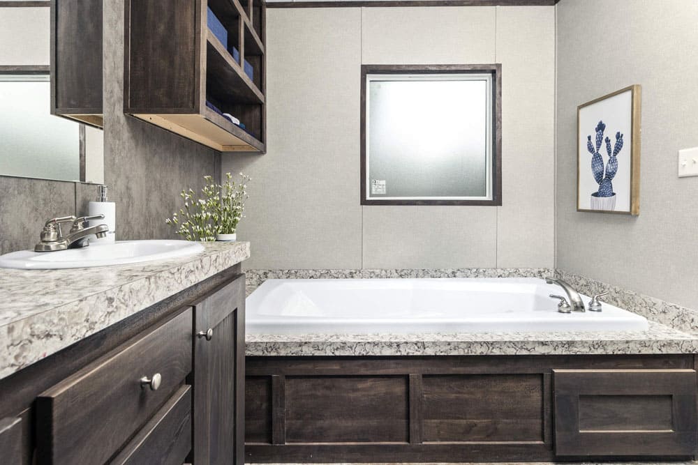 Soaking tub and vanity in The Grant, a 3-bedroom manufactured home