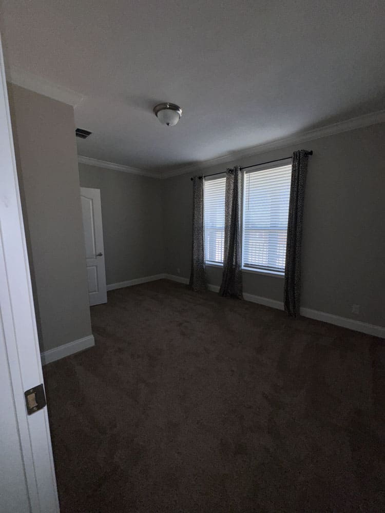 Fourth bedroom with double windows in The Lilly II modular home