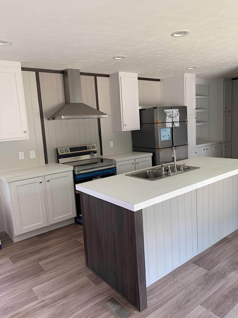 Large kitchen island and range hood in The Colossal Ultrawide