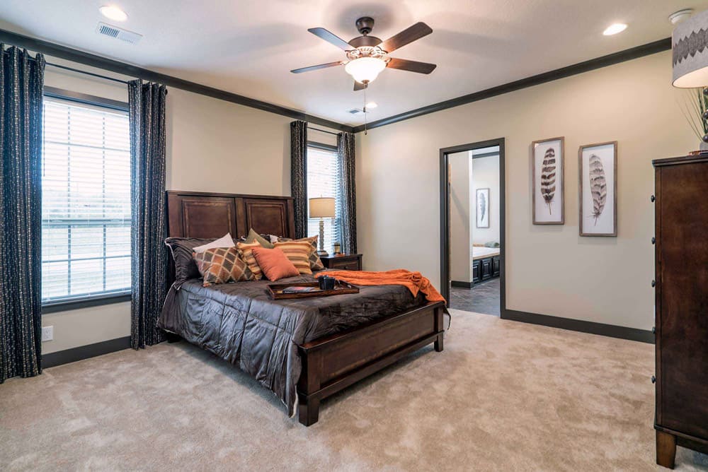 Spacious primary bedroom in The Nandina doublewide, Cedar Creek, TX