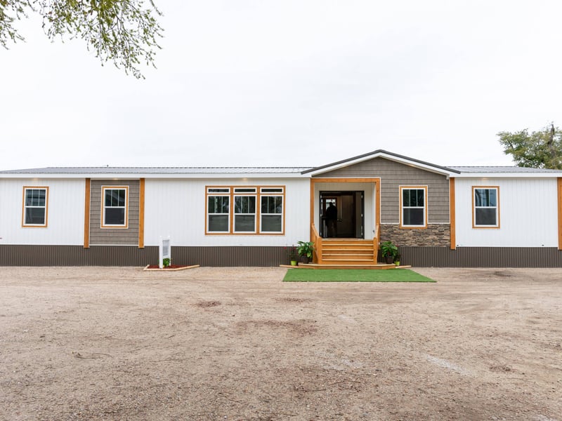 Front exterior of The Trinity CS-3242 double-wide home by Timber Creek Homes