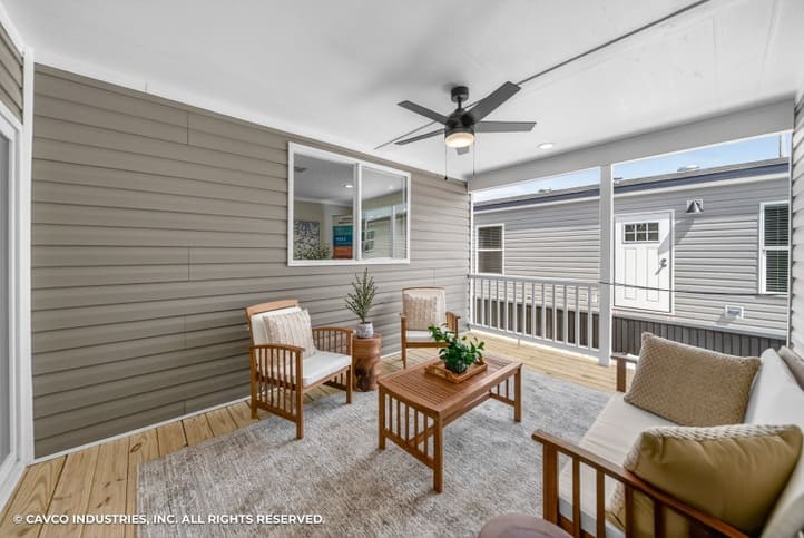 Spacious covered porch on the Cavco Vantage