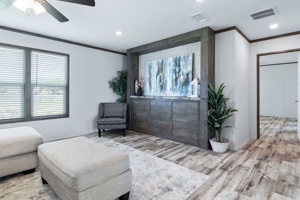 Bright family room with built-in storage in the Jessup Royal