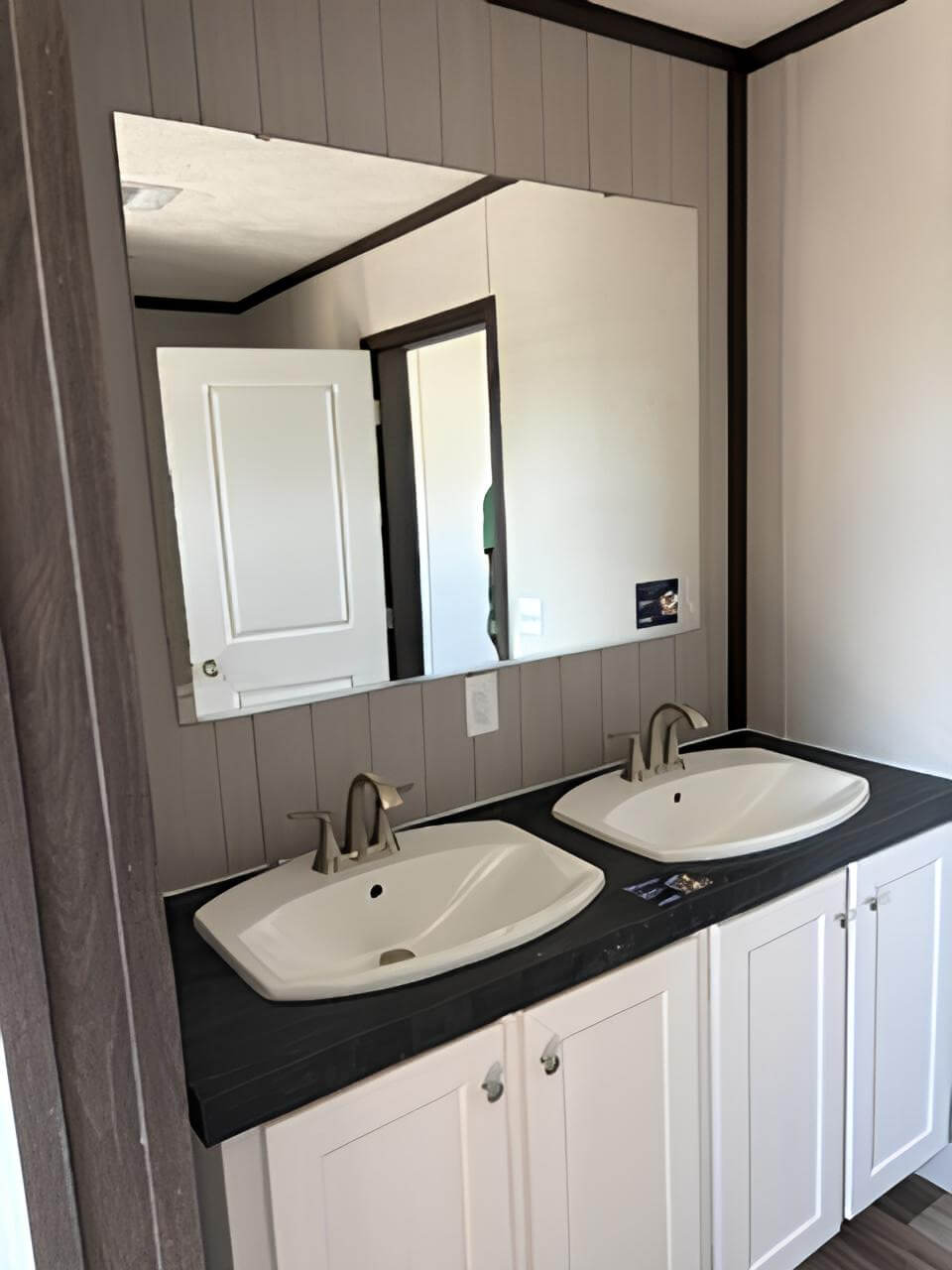 Double-sink primary bathroom vanity in The Blitz doublewide