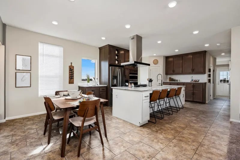 Additional open floor plan view in The Odyssey XL 3256 by Champion Homes