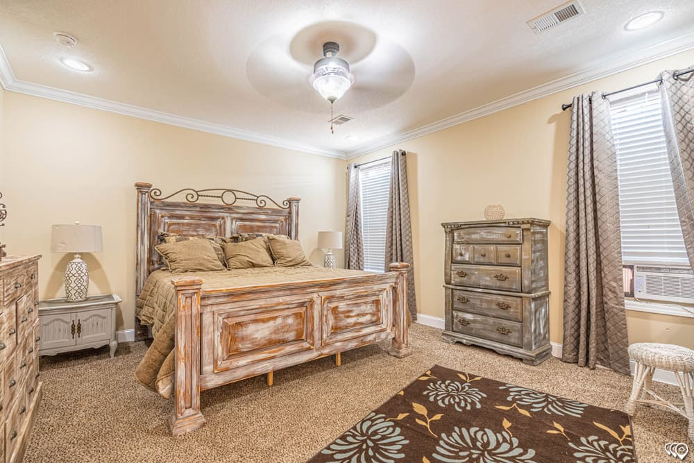 Spacious primary bedroom in The Woodland four-bedroom modular home