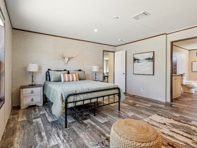 Staged bedroom in the Champion Prime 32x52 doublewide near Tyler TX