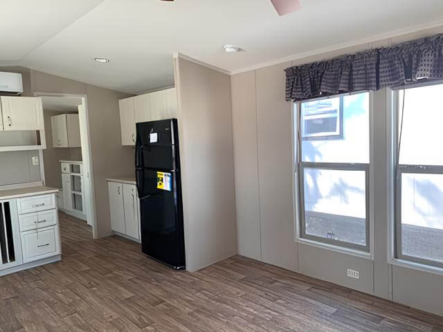 Open kitchen and living area inside the Tiny Hacienda 12x34