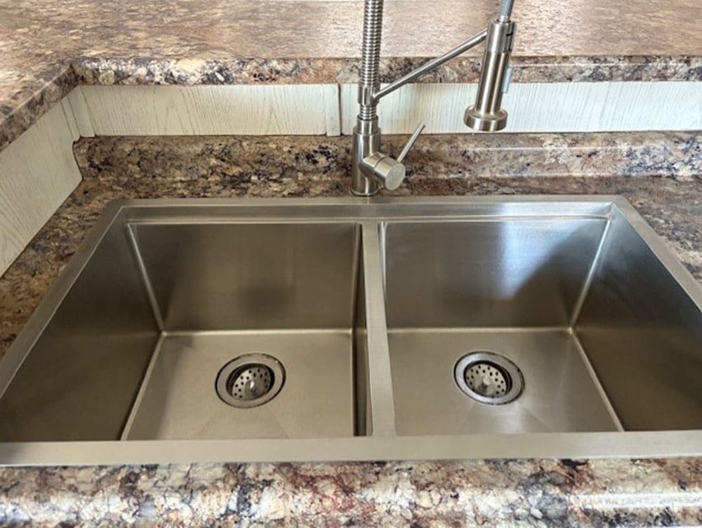 Double-basin kitchen sink in The Leslie manufactured home