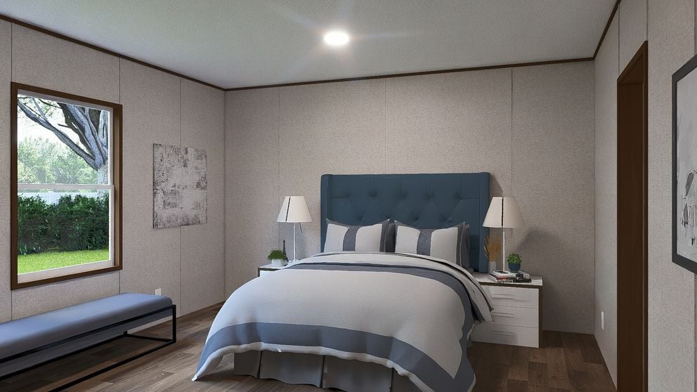 Primary bedroom in The Sycamore 4-bedroom manufactured home