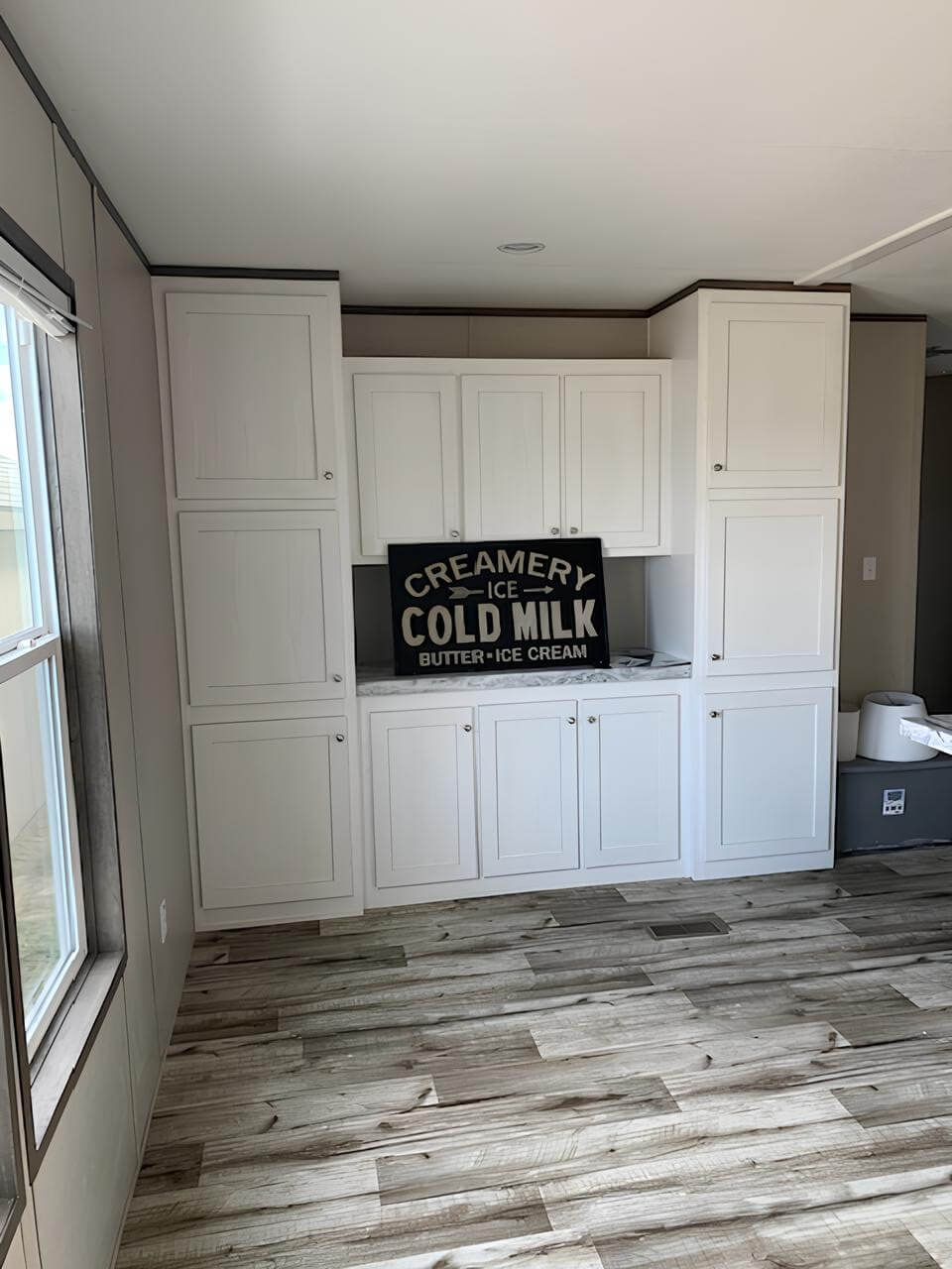 Built-in kitchen cabinets inside The Cuatro manufactured home