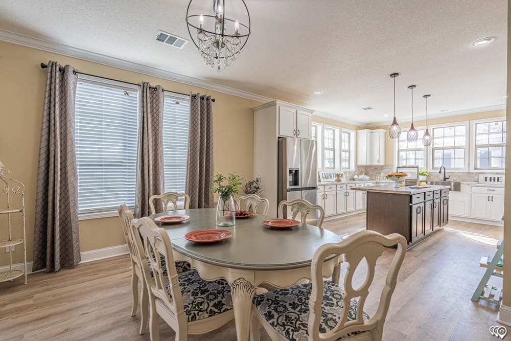 Open dining room and farmhouse kitchen in The Woodland