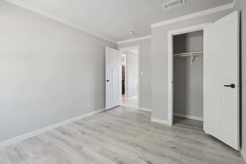 Secondary bedroom with private closet in The Carol 4-bedroom home by Champion Homes