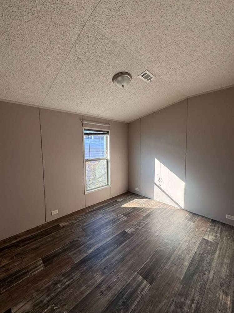 Bright second bedroom in The Leyla two-bedroom mobile home for sale