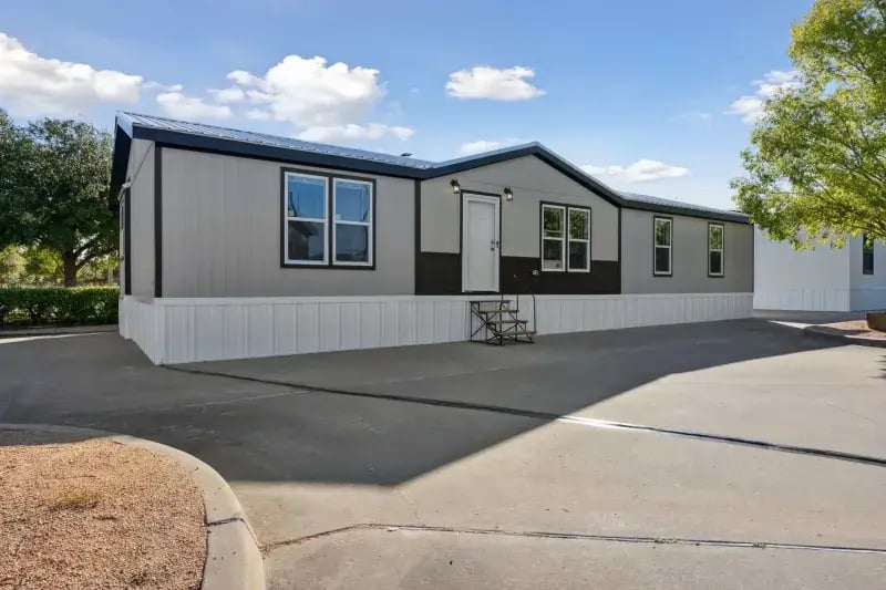 Front exterior of The Carol 4-bedroom home by Champion Homes, model AS2860H32A1A