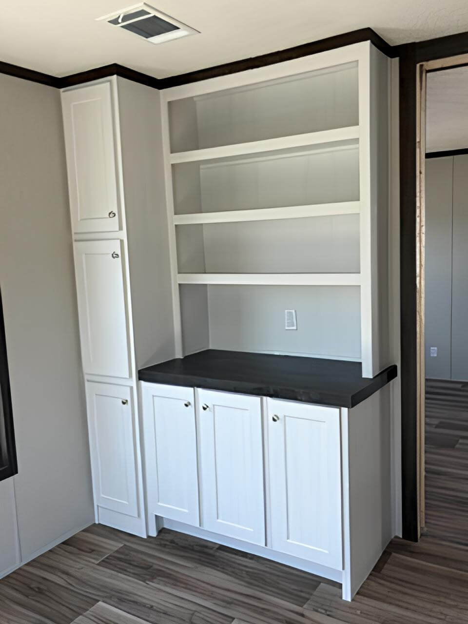 Built-in living room shelving and storage in The Blitz