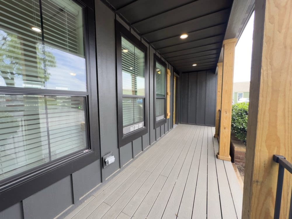 Spacious covered porch of The Riverwalk manufactured home