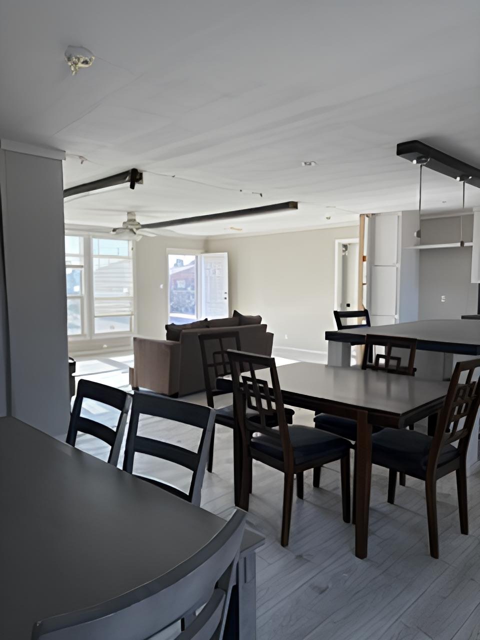 Dining and living room layout in used 4 bedroom mobile home for sale near Midland Odessa