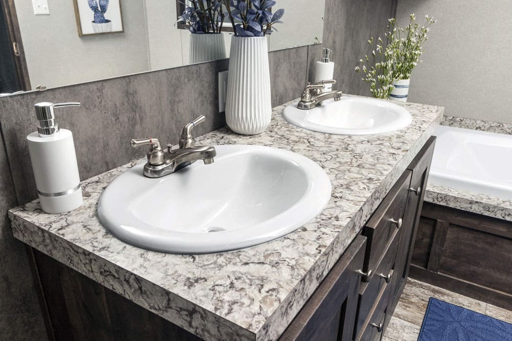Double-sink bathroom vanity in The Grant single-wide