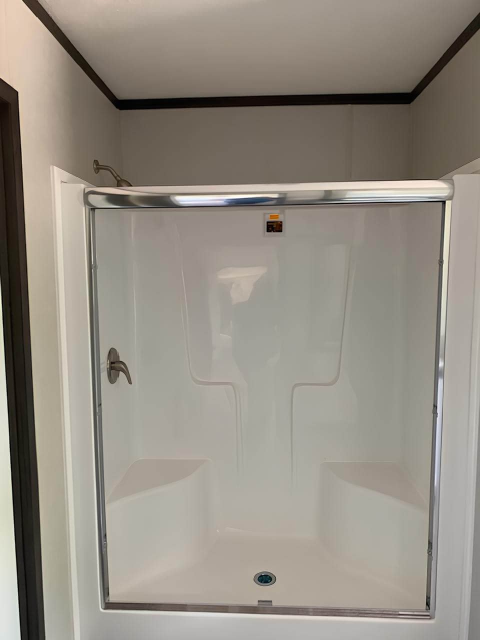 Walk-in shower in The Colossal Ultrawide manufactured home