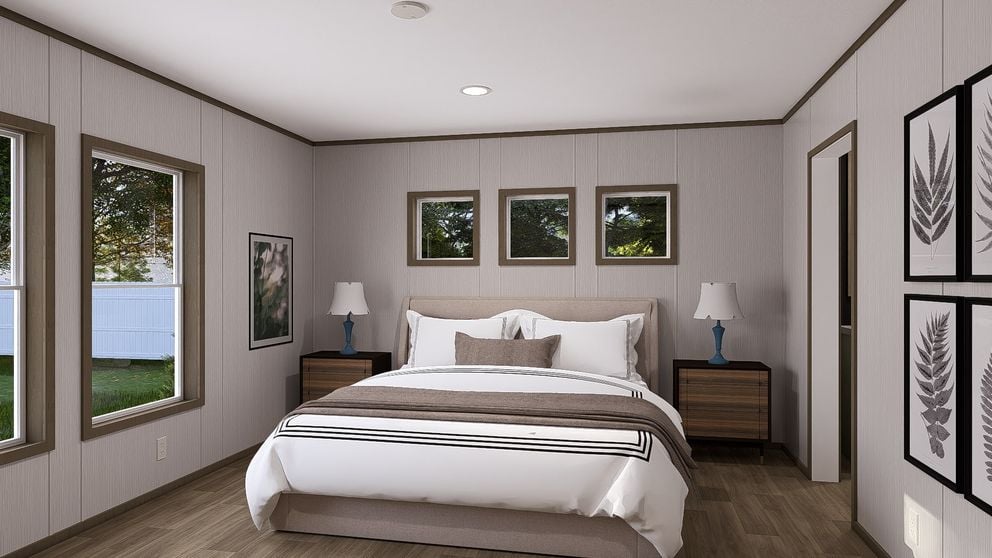 Spacious primary bedroom in the Clayton Epic Crockett by Factory Mobile Homes