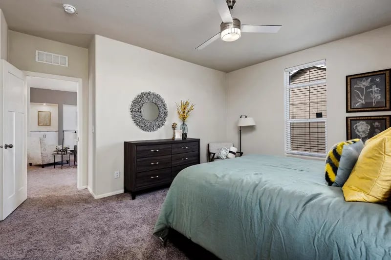 Primary bedroom in The Odyssey XL 3256 mobile home
