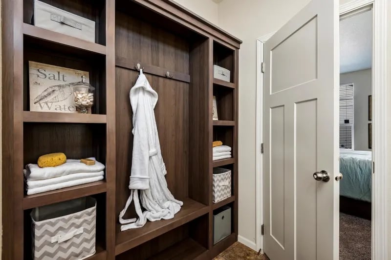 Bathroom storage in The Odyssey XL 3256 by Champion Homes available in Colorado