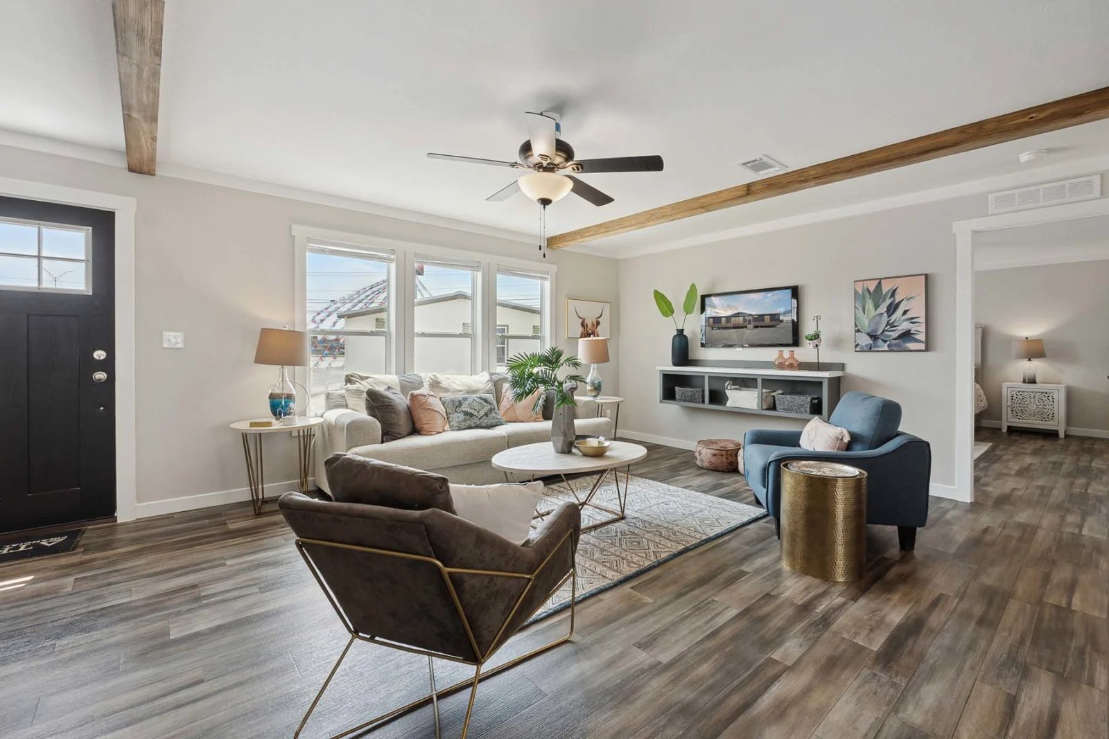 Bright living area in the Winter Series 32x56H by Champion Homes