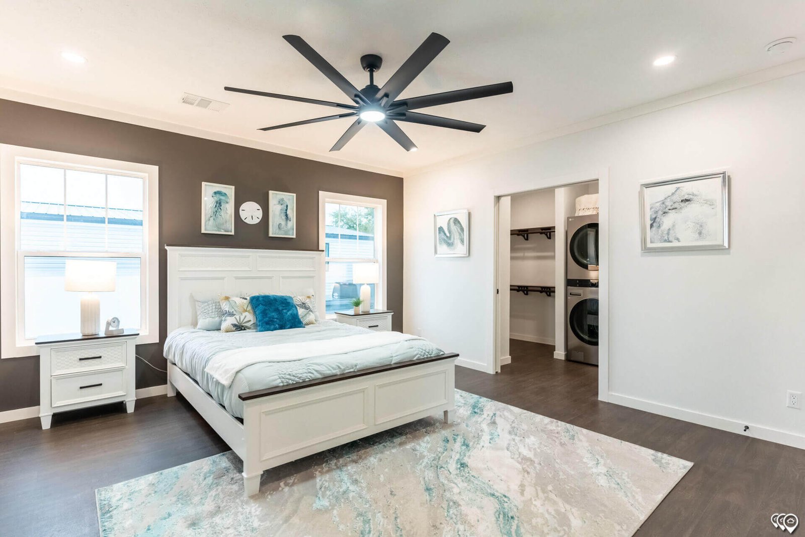 Primary bedroom and adjoining walk-in closet in The Trinity CS-3242