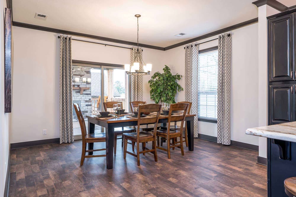 Dining area with patio access in The Nandina modular home