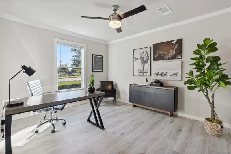 Flex room staged as a home office in The Carol 4-bedroom home by Champion Homes