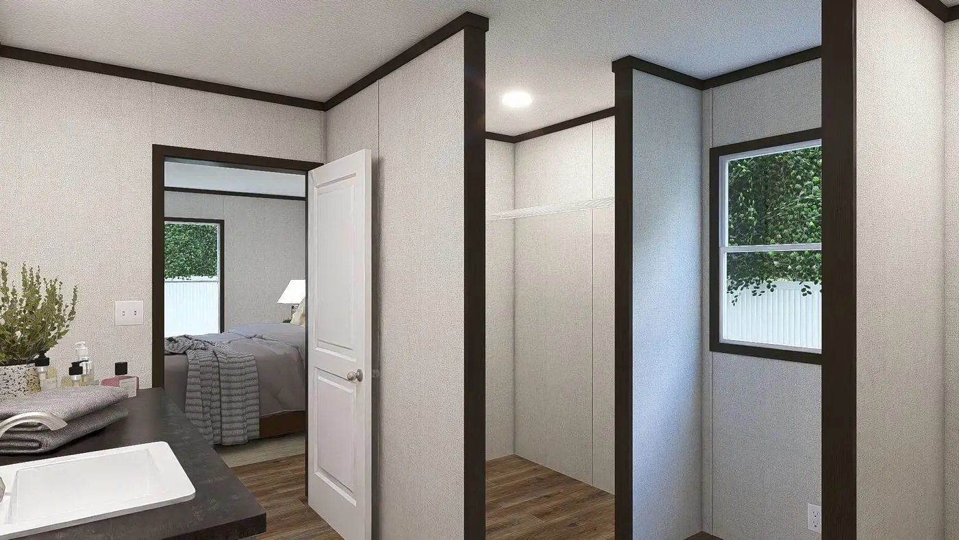 Primary bathroom and walk-in closet in model 35MYO32684AH, a 2,040 square foot factory-built home
