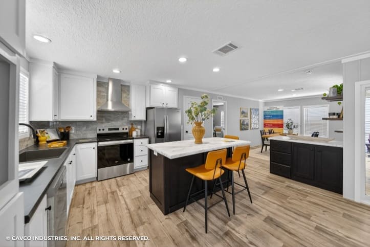 Spacious Cavco kitchen with center island in The Vantage double-wide home