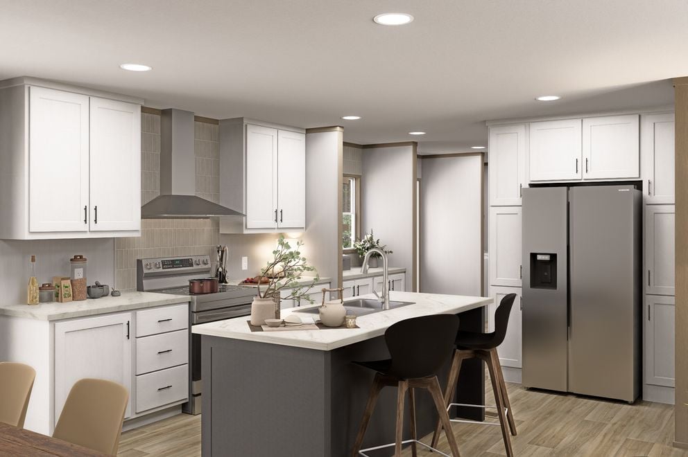 Modern double-wide kitchen with island in the Clayton Epic Snowcap