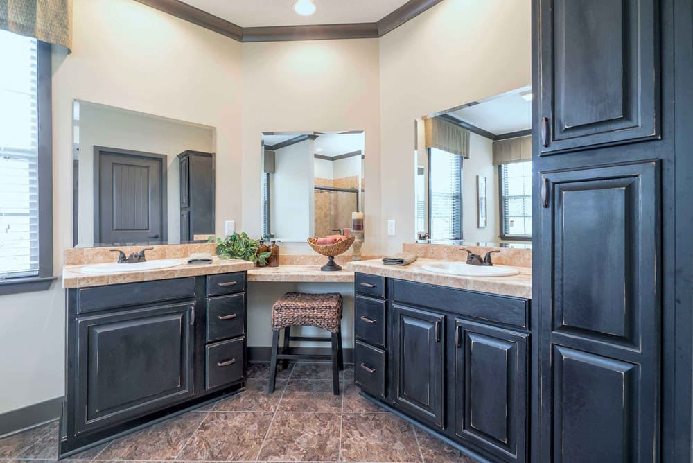 Dual-sink primary bathroom with vanity in The Nandina modular home