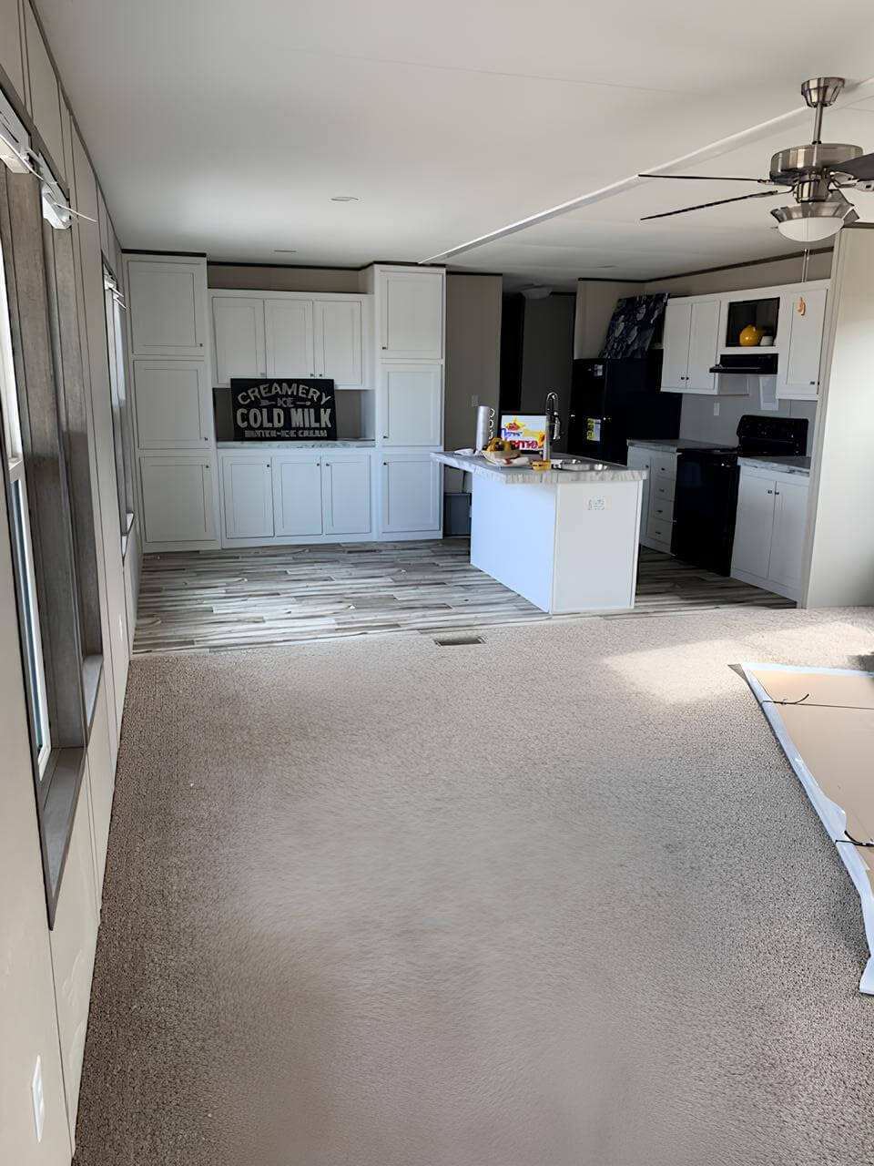 Open living room and kitchen in The Cuatro by Jessup Housing
