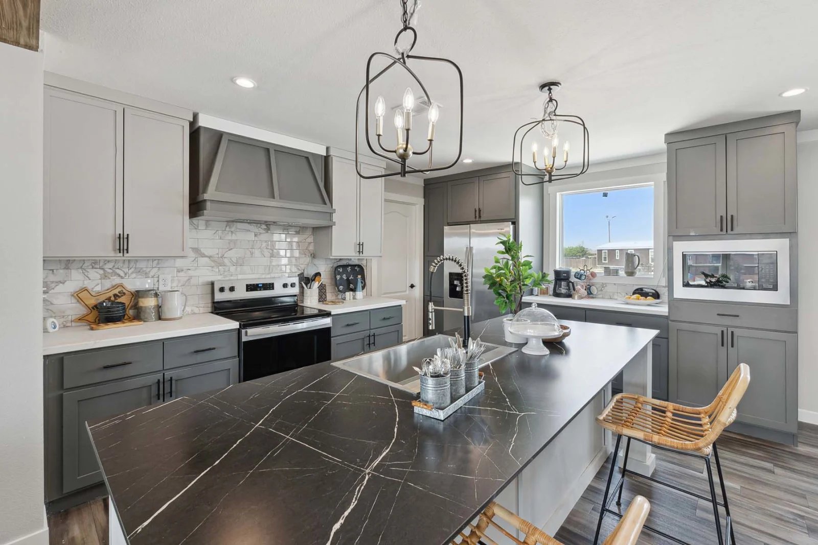 Kitchen island and cabinetry in the Winter Series 32x56H by Champion Homes