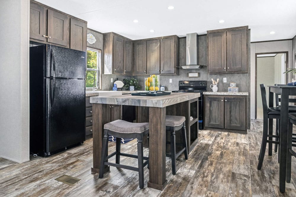 Modern kitchen with island in The Grant by Jessup Housing