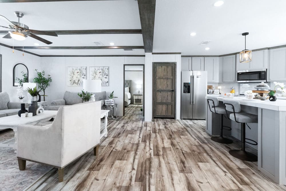 Expansive living room and kitchen in a four-bedroom home