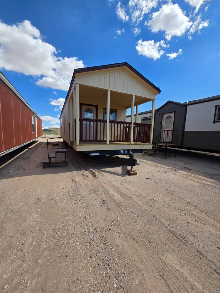 Front view of the covered porch in Legacy Housing S-1236-11FLA 12x36 home #5915 at New Start Homes in El Paso, TX